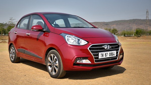 Hyundai Xcent 2018 front and side look on road
