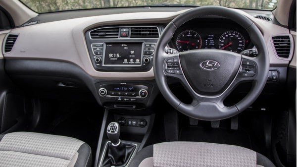 blue 2018 Hyundai Elite i20’s front cabin, behind-the-wheel view