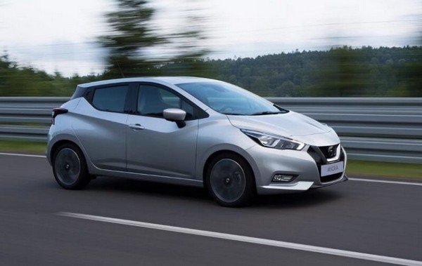 Silver 2018 Nissan Micra running on road, left side view