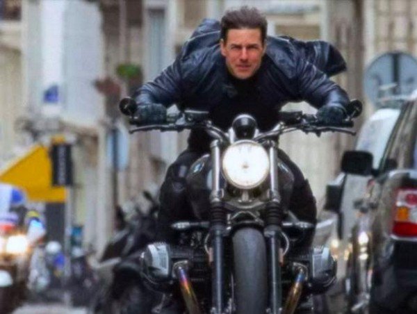 Tom Cruise riding a BMW R Nine T Scrambler