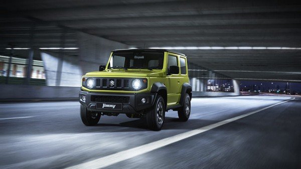 suzuki Jimny on the road, front view, green color