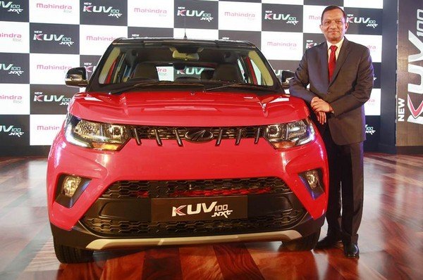 Mahindra KUV100 at showroom red color