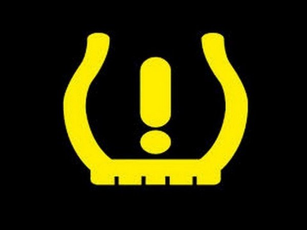 yellow icon of low tyre pressure