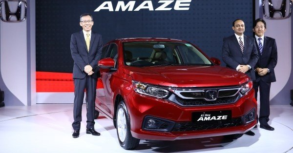 Honda Amaze 2018 red color with 3 man