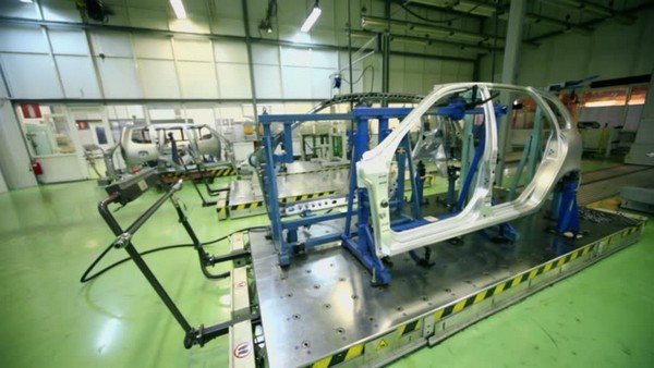 producing car frame in factory 