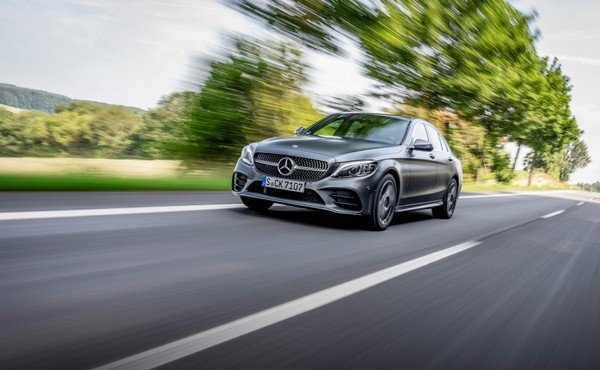 2018 Mercedes-Benz C-Class Facelift running on the road blurred background