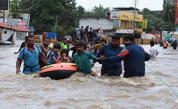 people secure boat floods