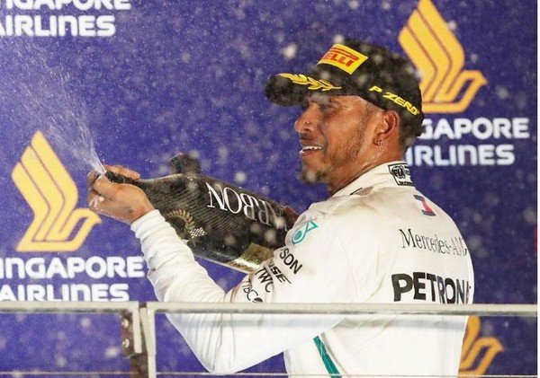 Lewis Hamilton is opening the champagne