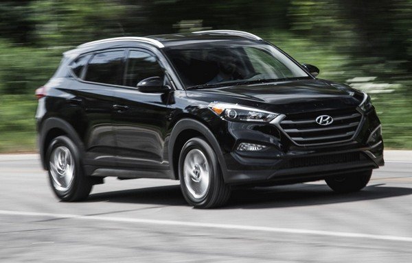 2019 Hyundai Tucson black colour running on the road blurred nature background