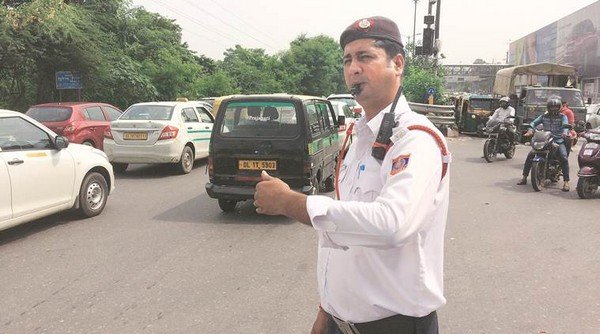 traffic police in the middle of an Indian street