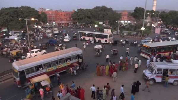 vehicles driving in different directions at an intersection