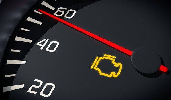 The illuminated “check engine” signal on a car’s speedometer