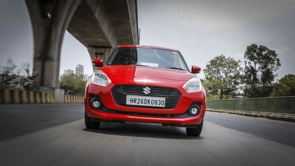 Maruti Swift red color on road