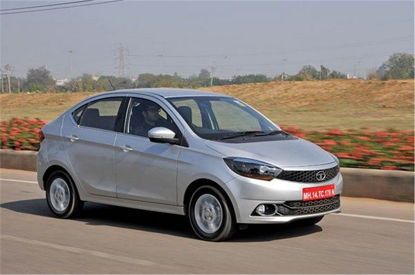 2018 Tata Tigor silver colour running on the road