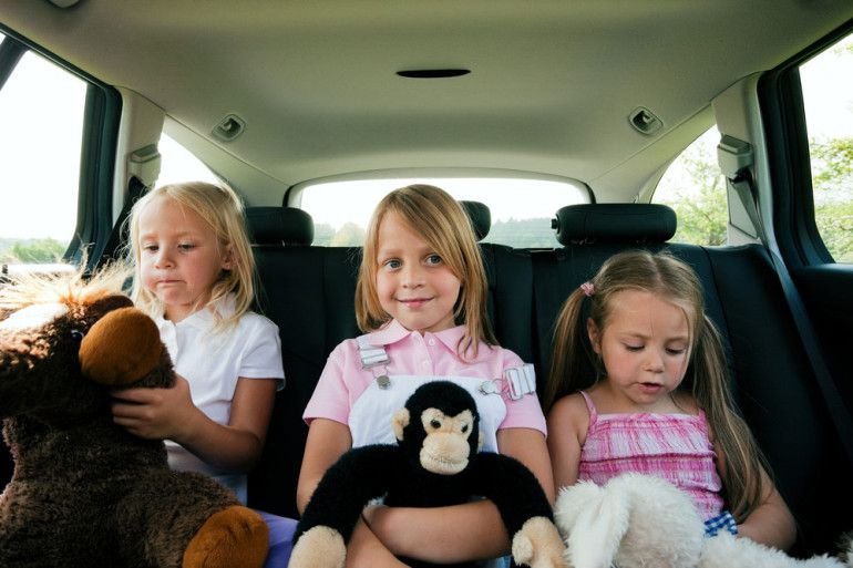 3-girls-sitting-in-a-car