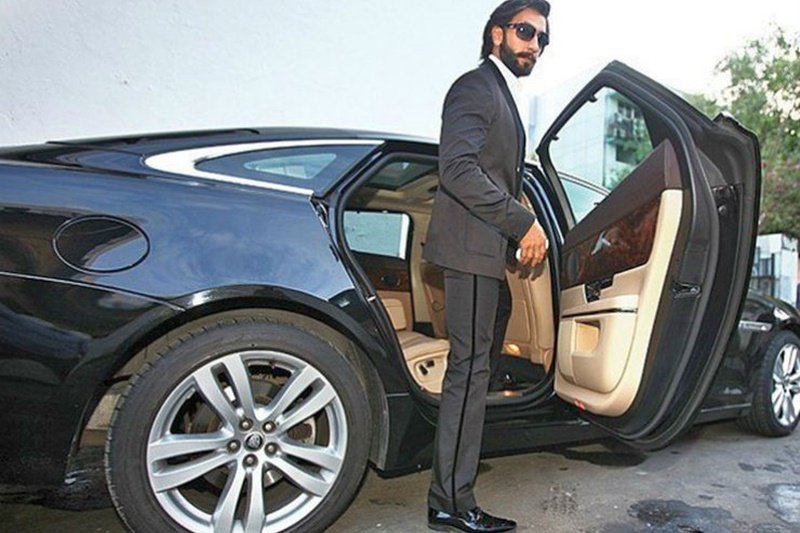 Ranveer Singh next to his Jaguar