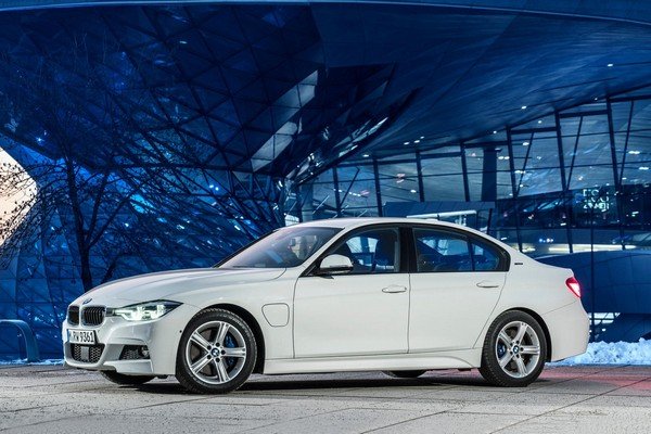BMW 330e Hybrid, white colour, left side