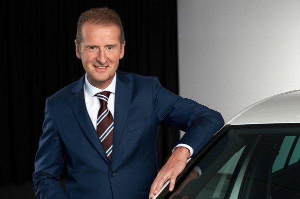 The CEO of Volkswagen Group, Herbert Diess put hand on car