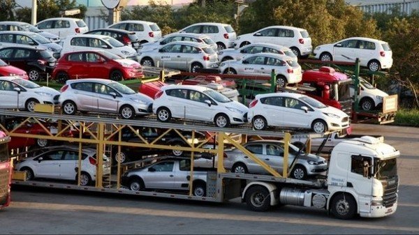 small cars carried by a truck