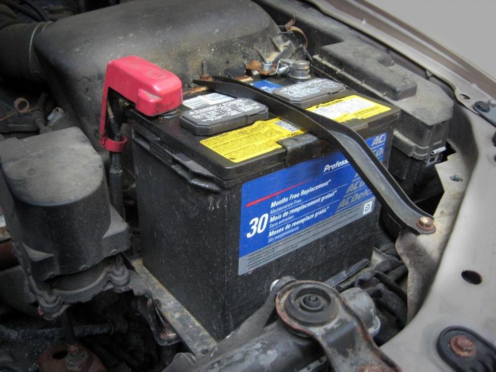 An old battery inside a car 
