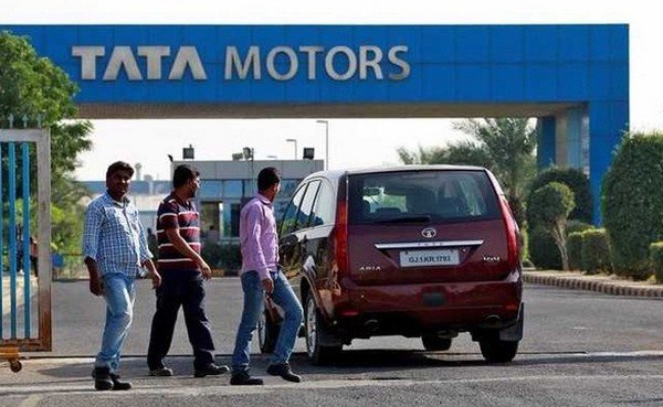 Tata Motors with passers-by in the front