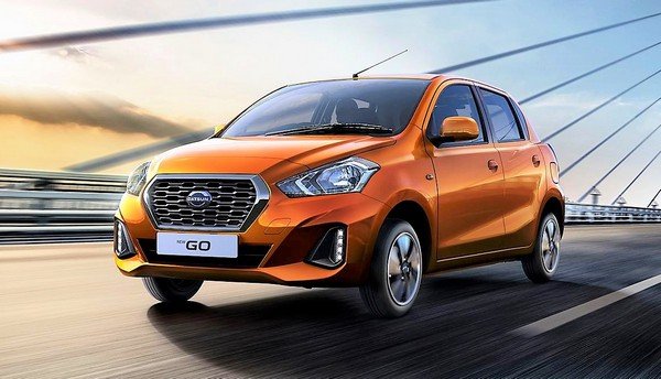 Datsun Go 2018 orange color on road front look 