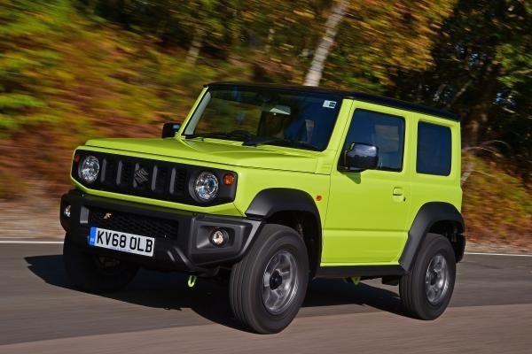 Suzuki Jimny green color front look on road