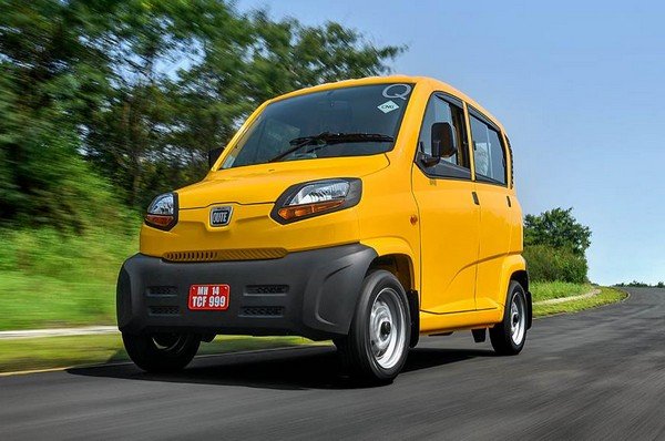 Bajaj Qute orange on road