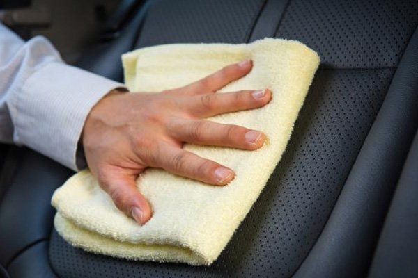 clean a car seat with a towel