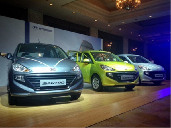 3 Hyundai Santro cars at the showroom