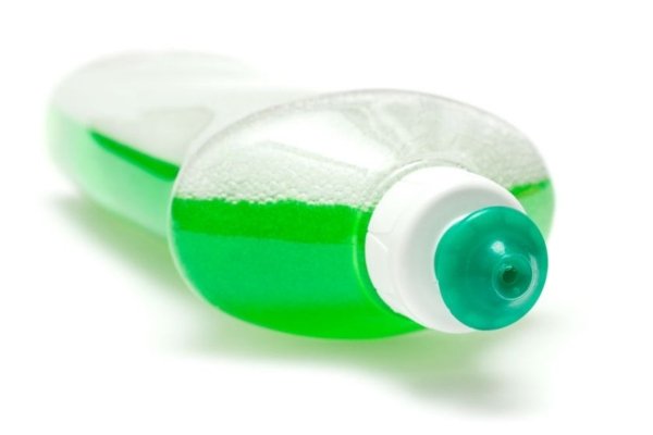 a bottle of green dish soap