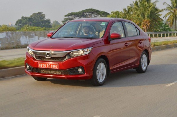 2018 Honda Amaze red front angle in action