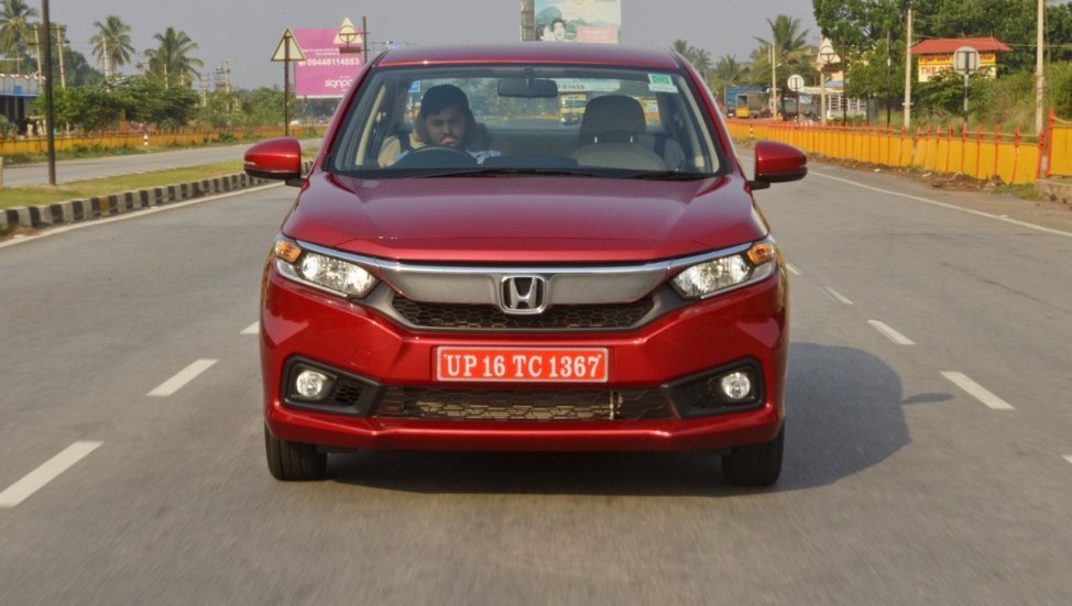 2018 Honda Amaze red front in action