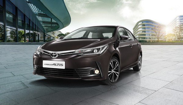 toyota corolla altis brown front angle