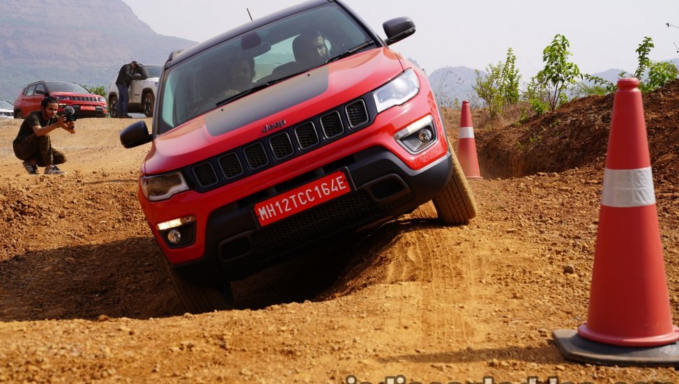 2019 Jeep Compass Trailhawk red front off-road action