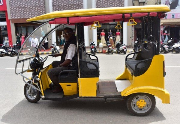 e-rickshaws yellow side profile