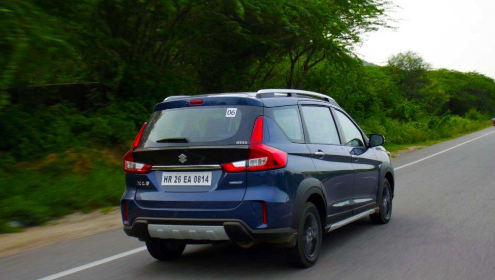 2019 Maruti XL6 blue rear angle in action