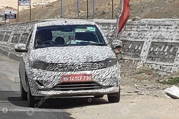 tata tiago facelift camouflaged front angle