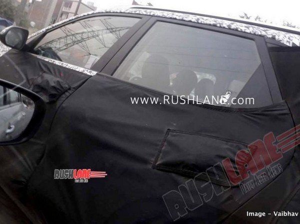 kia compact suv spotted side angle