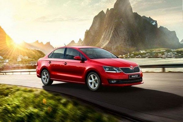 Skoda Rapid red colour side angle
