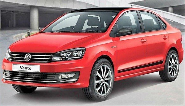 Volkswagen Vento red colour front three quarters left side