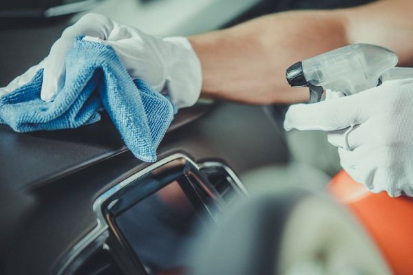 Cleaning car interior with gloves