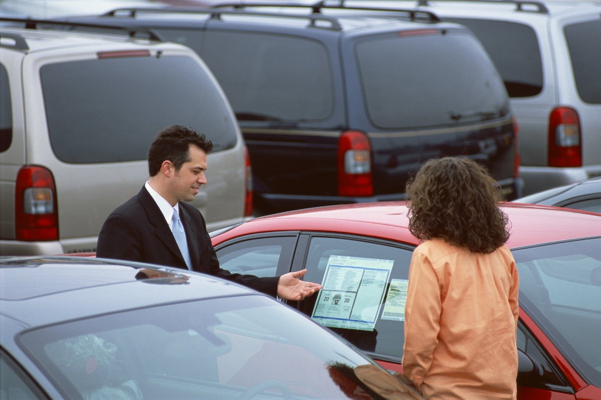 a car salesman and customer