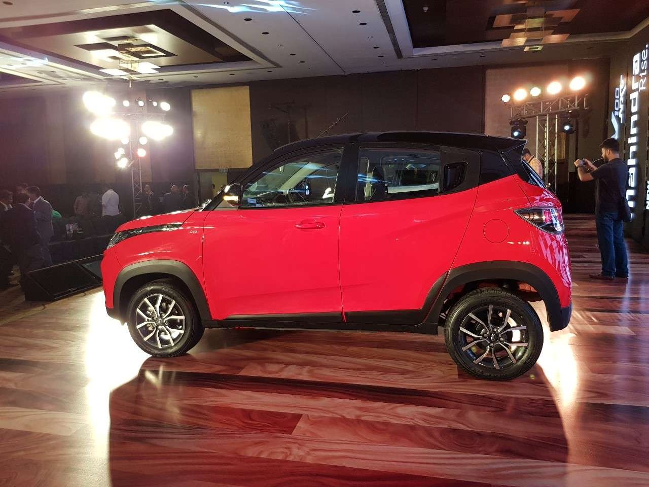 Mahindra KUV100 NXT red side profile