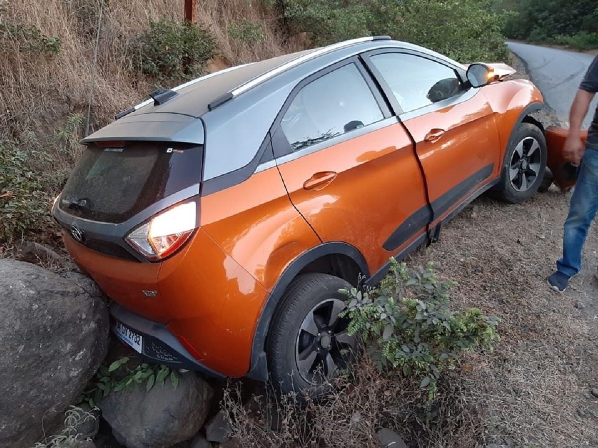 Tata Nexon Crushed Between Rock And Another Vehicle, All Passenger Safe