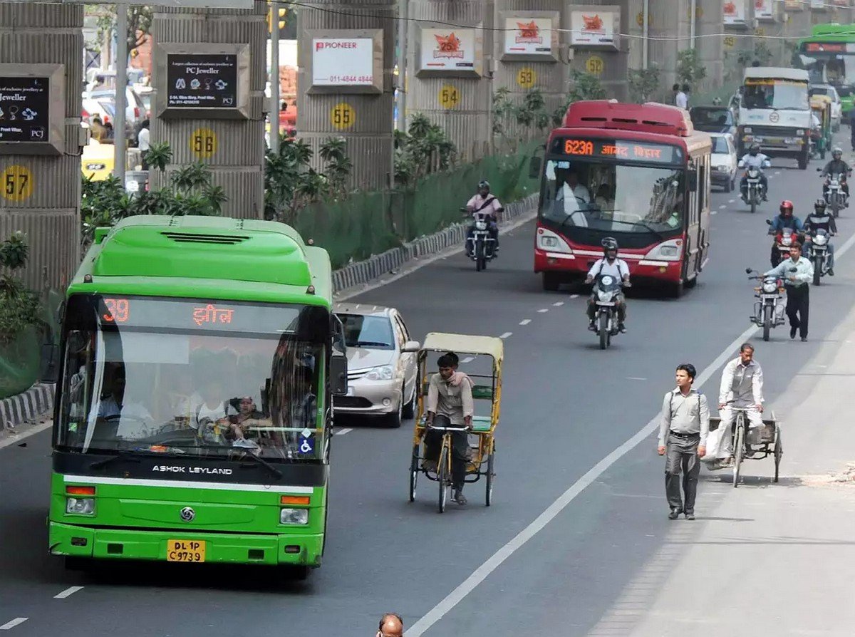 bus and bikes plying on road