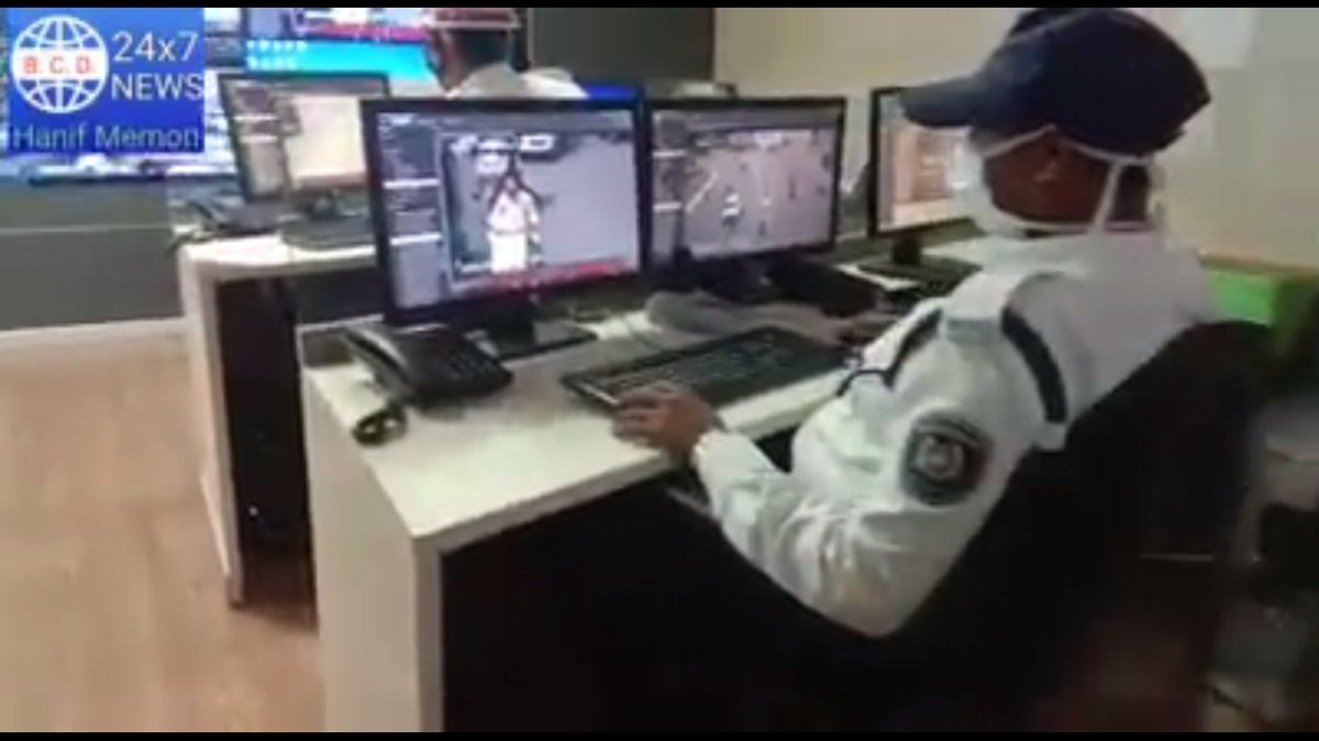 Traffic Police monitoring CCTV footage for traffic offenders
