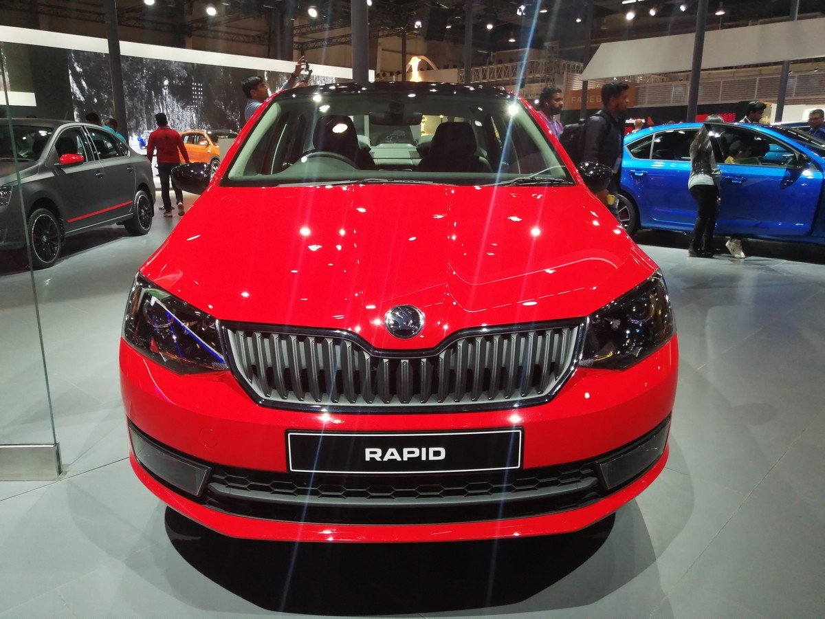 skoda rapid red colour front end