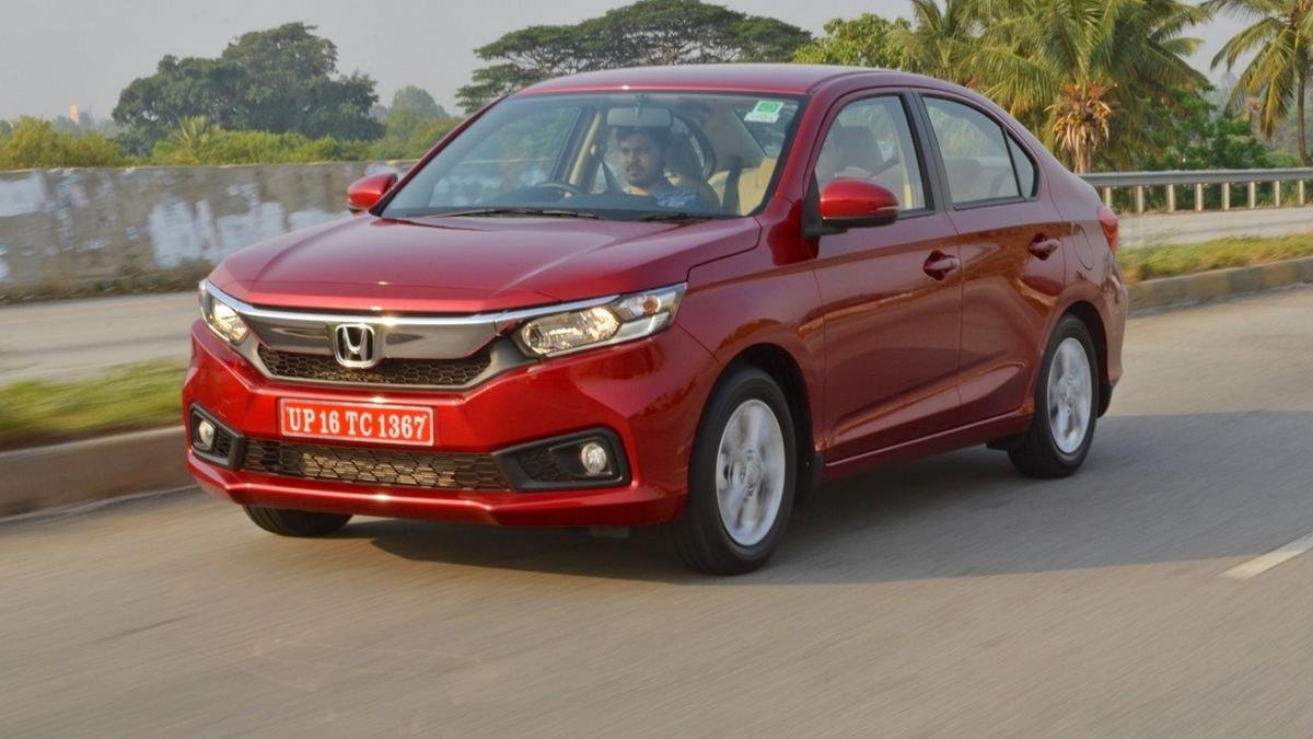 used sedan cars in India - 2018 honda amaze front three quarters