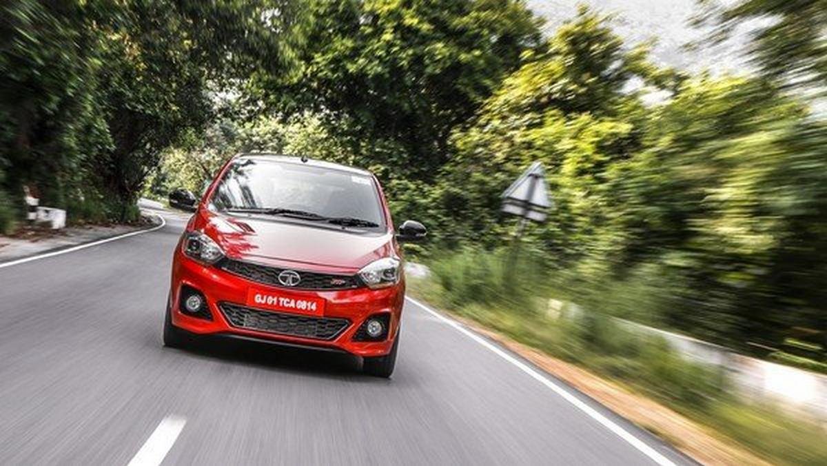 Tata Tiago JTP red color front face running on road